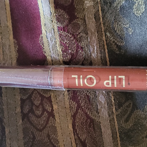 bath and body works and loreal Other - Bath body works duo  lip oil fab sealed tagged full size caramel and my choice